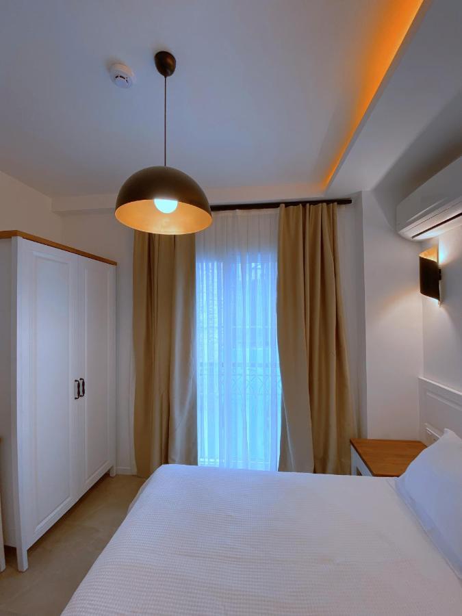 Amber Boutique Hotel Кешме Экстерьер фото